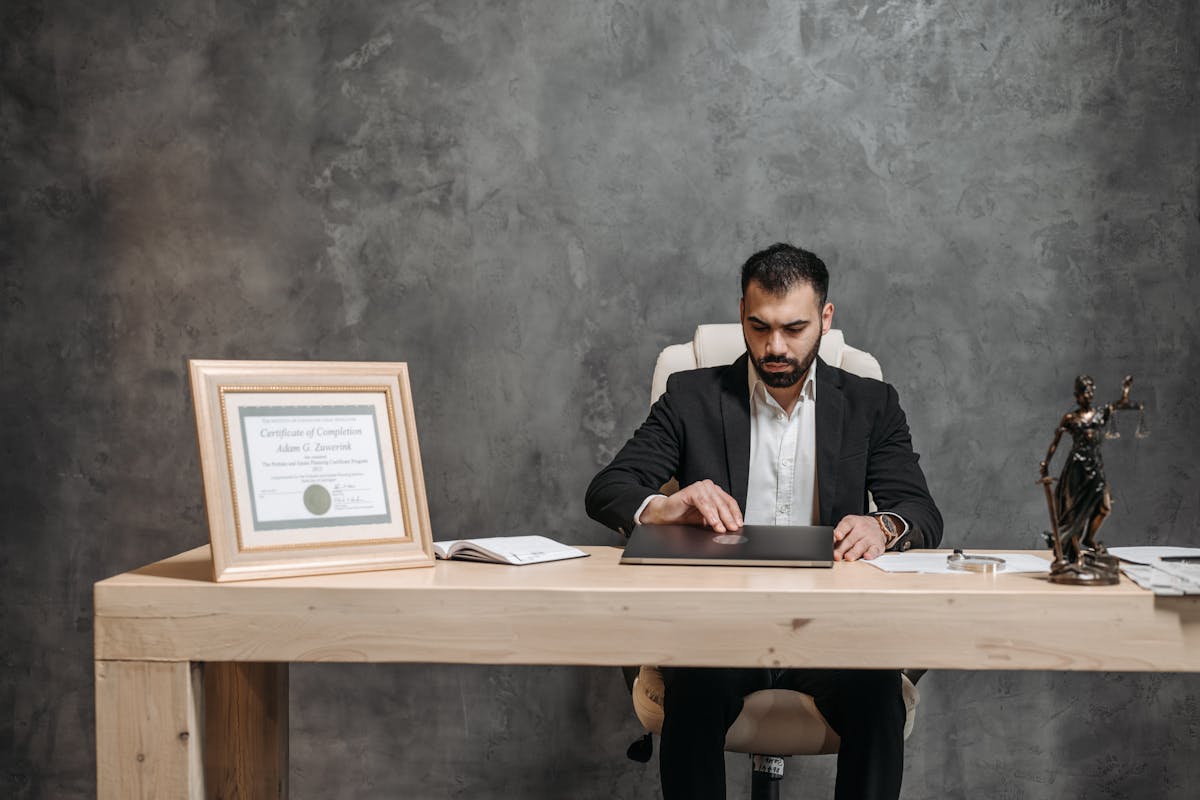 Professional Lawyer using a Laptop
